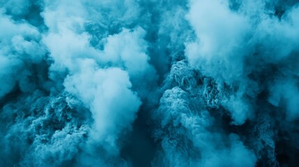 Obraz premium Soft blue clouds merge and flow gracefully, creating a mystical atmosphere over the calm sea as twilight settles in, inviting tranquil thoughts and reflections