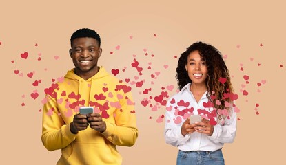A smiling couple stands together, each holding a smartphone. They celebrate Valentine's Day by exchanging sweet messages online, surrounded by a flurry of hearts.