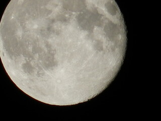 Close-Up of the Full Moon in a Dark Night Sky. Lunar Photography