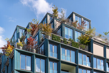 Sustainable Urban Living: A showcase of modern eco-friendly residential architecture integrating...