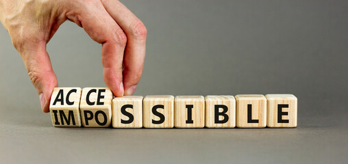 Accessible or impossible symbol. Concept words Accessible or Impossible on beautiful wooden blocks....