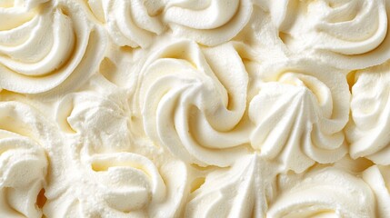 Close-up of swirls of creamy frosting on a cake