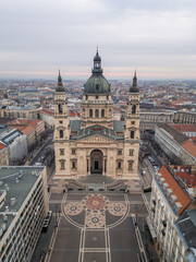 St. Stephen's Basilica dominating Budapest cityscape on an overcast day vertical Aerial view