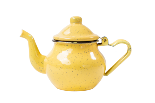 vintage enamel yellow teapot with spotted pattern with curved spout and handle resembling heart shape isolated on transparent background