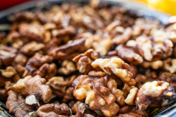 Peeled and toasted walnuts close-up in a plate