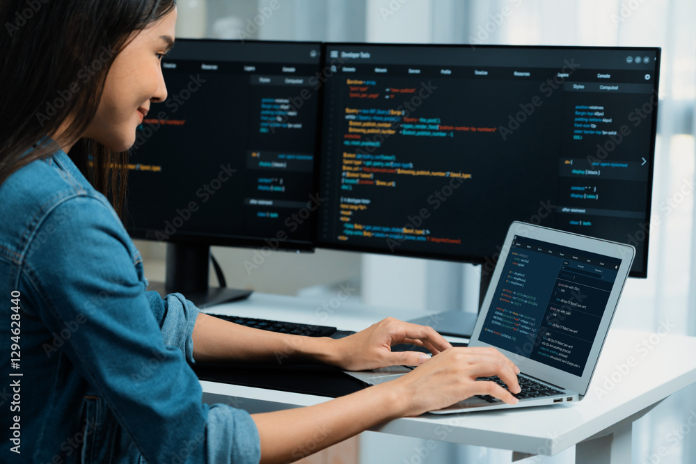 Poster smiling young asian in it developer creating with typing online information on laptop with coding pr