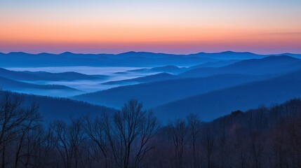 Obraz premium Serene Mountain Landscape at Dawn with Misty Valleys