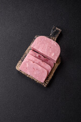 Delicious canned pink ham with salt, spices and herbs