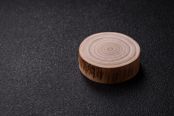 Round wooden cut of a tree or branch with annual rings