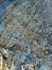 Layered rock formation stone background 