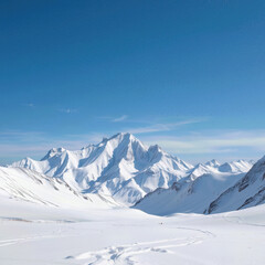 Obraz premium mesmerizing snowy mountain range stretches under clear blue sky, evokes sense of wonder and freedom. vastness inspires awe and invites exploration