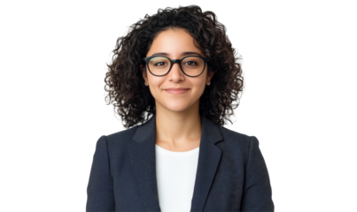 Confident Woman: A poised woman in a professional suit and glasses radiates confidence with a warm and engaging smile.