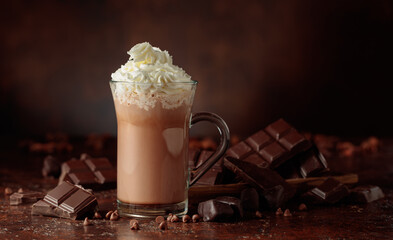 Hot chocolate cocoa drink with whipped cream.