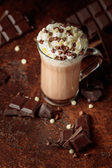 Hot chocolate cocoa drink with whipped cream.