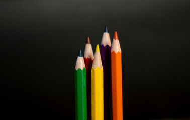 Bright Pencil Colors on Black Background