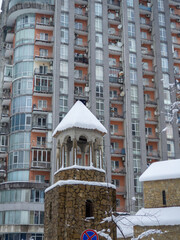 Snow-covered streets of the city on the Black Sea coast. Snowdrifts on the streets of Batumi. Difficult situation. Unexpected frost in the south.