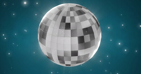 Image of white spots over disco ball