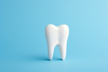Tooth model isolated on blue background with copy space. 3d illustration. Dental concept with copy space