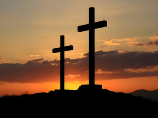 Silhouette of Two Crosses at Sunset