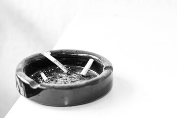 cigarette and ashtray