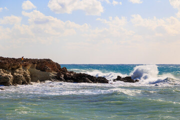 Rocky coastal cliffs with sea caves and waves, Greece, Cyprus, Paphos, 24.11.2025..