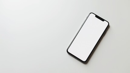 Close-up of a blank white screen on a smartphone lying on a white background.