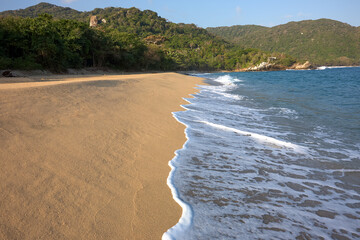 The pristine beaches of Tayrona National Park invite you to a world where turquoise waters meet...