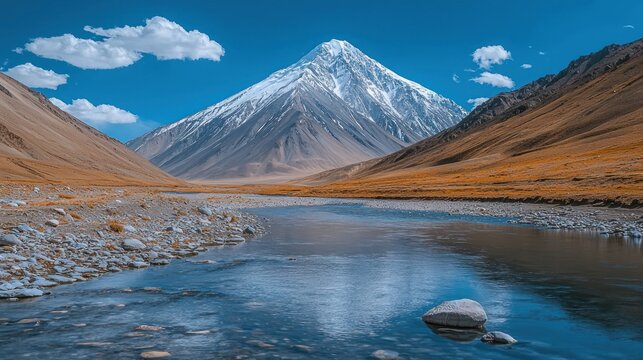 Majestic mountain reflected in tranquil river valley