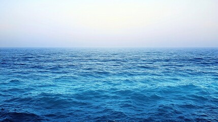 Obraz premium A serene view of the ocean with calming blue hues and a tranquil horizon.