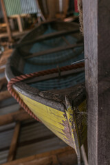 Old yellow fishing boat at display