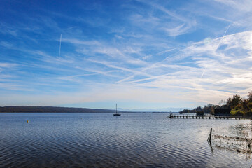 Sailboat on Ammersee with mountain view, Germany, Riederau, 01.11.2024..