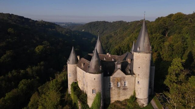 Discover the enchanting Veves Castle nestled in serene Belgian woodlands