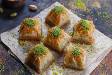 Turkish-style pistachio baklava with a glass of milk.