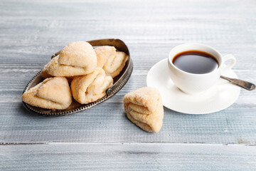 Homemade nut shaped russian soviet cookies and wafer rolls with pastry cream.