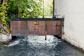 Water level regulating gates in a city Annecy - France