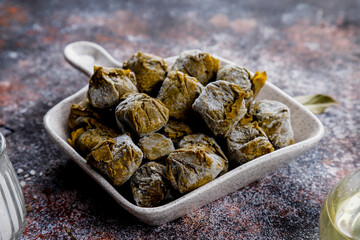 Dolma - stuffed grape leaves with rice and meat.