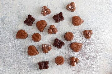 Handmade chocolate with pistachios, dark and milk chocolate pieces.