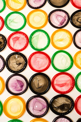 Colorful condoms background.