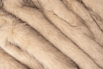 Texture of faux fur as a background, top view.