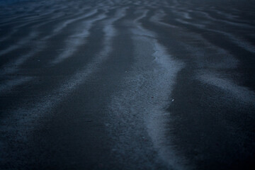 Dark sand beach