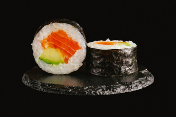 traditional Japanese sushi on a black background
