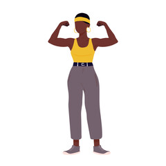 A woman with a yellow tank top and black pants is flexing her muscles. Concept of strength and confidence