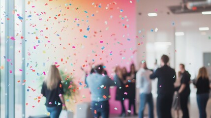Employees celebrating a milestone with confetti and cheers in a modern open workspace, vibrant and lively ambiance,