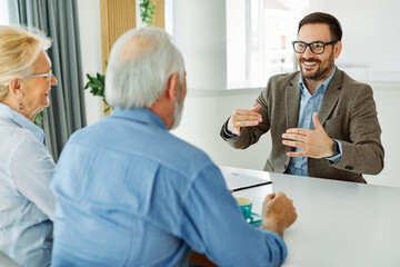 meeting agreement investment couple contract advice retirement consultation house finance senior...