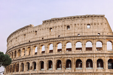 Panoramic view of old Colosseum in Rome. Beautiful popular of ancient landmark. Famous card of city...