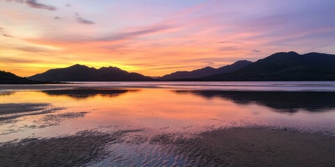 Breathtakingly Beautiful Sunset Over a Serene Mountain Lake with Colorful, Vibrant Reflections
