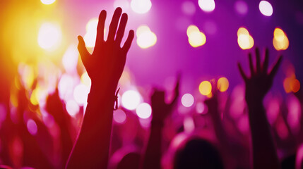 Joyful concert atmosphere with raised hands celebrating music and summer vibes