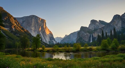 Fototapeta premium River Flowing Through Valley Surrounded by Mountains and Greenery