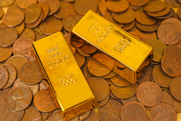 Gold bars and coins as background, closeup