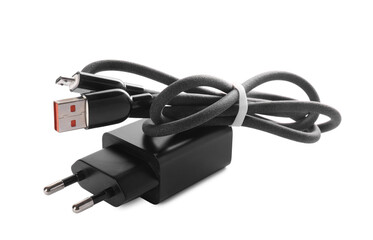 USB power adapter and charge cable isolated on white
